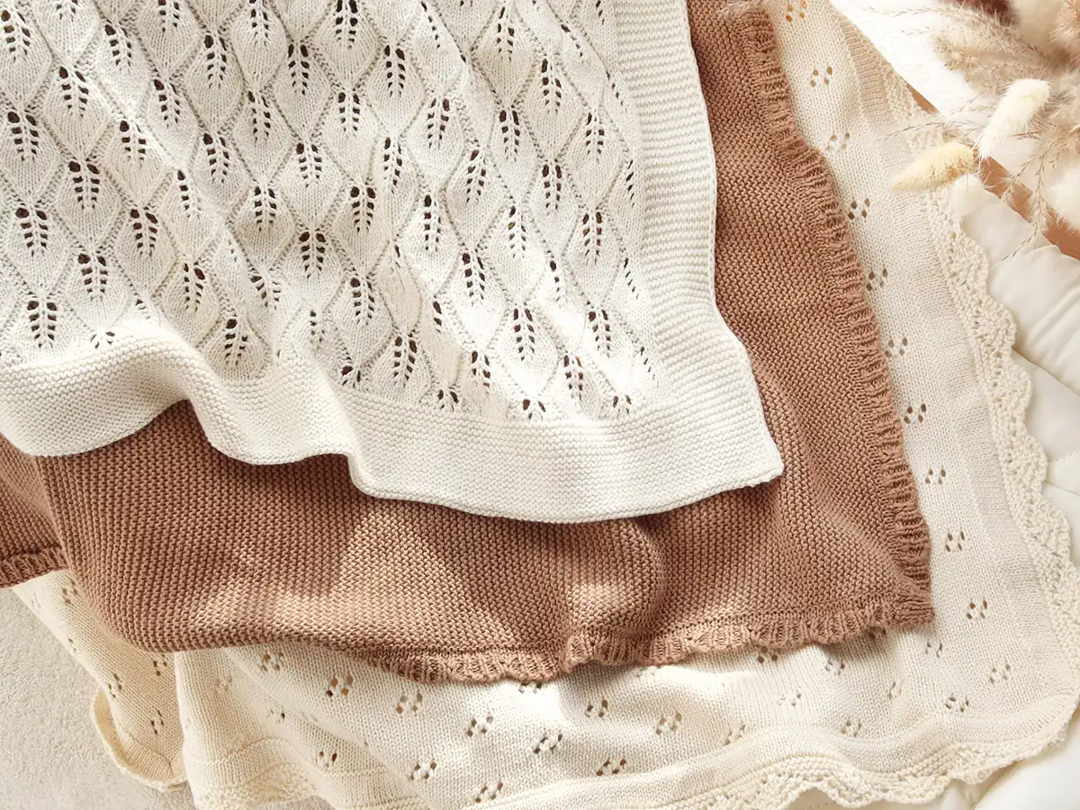 Classic knitted baby blankets in neutral colors