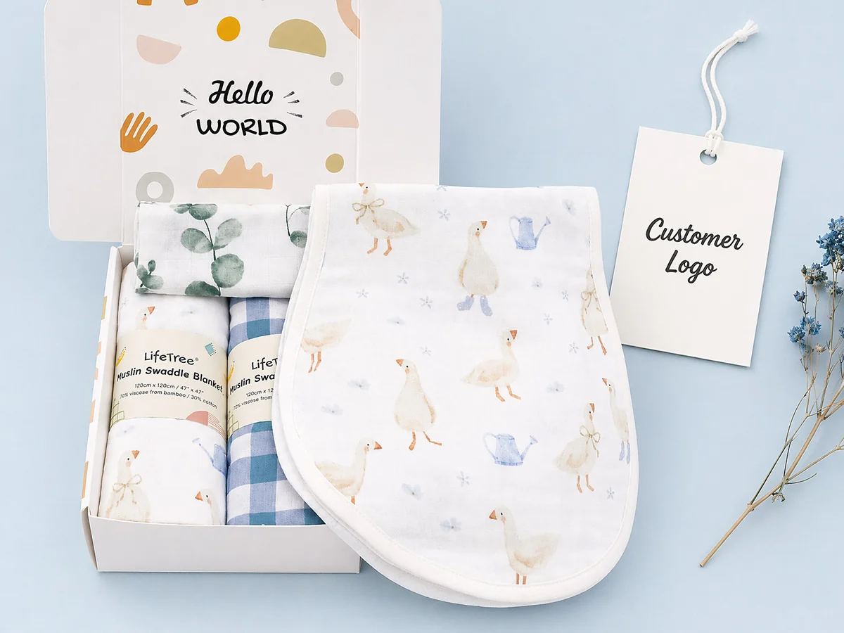 Starter newborn gift set with muslin swaddle and baby essentials