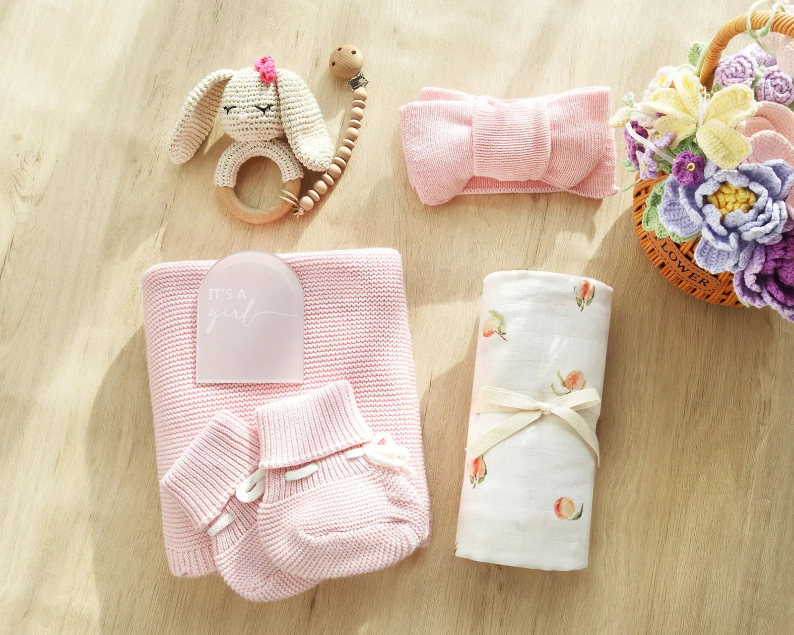 Custom baby product range with swaddles, blankets, clothing and gift sets
